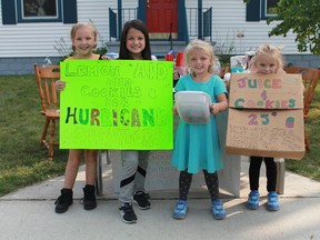 A group of elementary school-aged Good Samaritans sold lemonade and cookies on the corner of Devine and Savoy Streets to raise money for victims of Hurricane Irma on Sept. 15. Over three days of sales, the girls raised $210. From left to right: Chaeli, 7, Honour, 8, Nevaeh, 4 and Audrey, 6.
CARL HNATYSHYN/SARNIA THIS WEEK