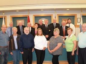 Moore Community Recreation Foundation chair Jane Marsh (second from right front row) joins St. Clair Township council in congratulating this year's Moore Community Recreation Foundation grant winners. 
CARL HNATYSHYN/SARNIA THIS WEEK