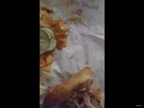 Maggots are seen in the wrapper of buffalo chicken cheesesteak hoagie. (Video screenshot)
