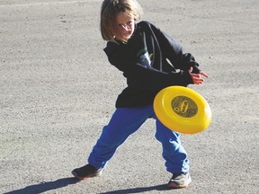 Frisbee toss was just one of several activities for children at the Drayton Valley Thunder tailgate party held at the back of the Omniplex on September 16, a few hours before the team played the Sherwood Park Crusaders.
