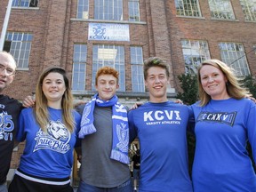 Current students and staff are celebrating their school with alumni in Kingston and around the world at the 225 Reunion Celebration for Kingston Collegiate, running Sept. 28 to Oct 1. Teachers Matt Saunders, left and Helena Huskilson, right, show off their school pride outside Kingston Collegiate with students Breyanna Knight, Zeke Wilson, and Hunter Leonard in Kingston, Ont. on Thursday September 21, 2017. Julia McKay/The Whig-Standard/Postmedia Network