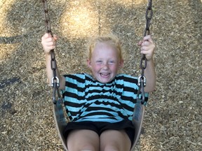 While experts noodled the science of kids? play at a London hotel Tuesday, Lily Azotini, 5, did some hands-on work at Thames Park. (DEREK RUTTAN, The London Free Press)