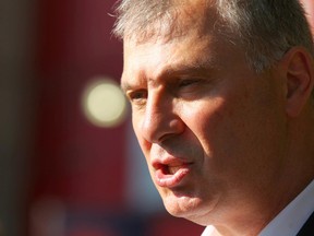 CFL commissioner Randy Ambrosie speaks to media prior to CFL action between the Hamilton Tiger Cats and the Calgary Stampeders in Calgary at McMahon Stadium July 29, 2017. (Jim Wells/Postmedia)