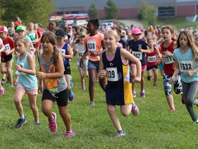 Grade 3-4 girls participate in the Laurentian Challenge at Laurentian University in Sudbury, Ont. on Tuesday, September 26, 2017. More than 2,100 elementary school runners from 40 schools across Greater Sudbury and Northern Ontario participated in the event. John Lappa/Sudbury Star/Postmedia Network
