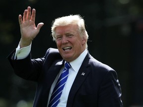 U.S. President Donald Trump waves as he walks on the South Lawn prior to his departure from the White House September 26, 2017 in Washington, DC. President Trump is travelling to New York City to participate in a roundtable with Republican National Committee supporters and deliver remarks to an RNC finance dinner. (Photo by Alex Wong/Getty Images)