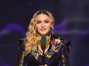 Madonna speaks on stage at the Billboard Women in Music 2016 event on December 9, 2016 in New York City. (Photo by Nicholas Hunt/Getty Images for Billboard Magazine)