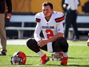 In this Nov. 15, 2015, file photo, Cleveland Browns quarterback Johnny Manziel looks on before an NFL football game against the Pittsburgh Steelers in Pittsburgh. (AP Photo/Gene J. Puskar)