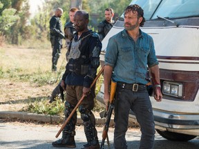 In this image released by AMC, Lennie James portrays Morgan Jones, left, and Andrew Lincoln portrays Rick Grimes in a scene from "The Walking Dead." The eighth season premieres on Oct. 22. (Gene Page/AMC via AP)