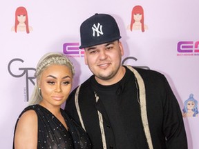 Rob Kardashian and Blac Chyna arrive at her Blac Chyna Birthday Celebration And Unveiling Of Her 'Chymoji' Emoji Collection at the Hard Rock Cafe on May 10, 2016 in Hollywood, California. (Photo by Greg Doherty/Getty Images)