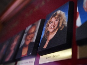A picture of Senator Lynn Beyak accompanies other official portraits on a display outside the Senate on Parliament Hill in Ottawa on Thursday, Sept. 21, 2017. (THE CANADIAN PRESS/Sean Kilpatrick)
