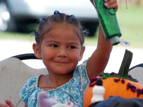 Darcelle Williams, 5, decorates a pumpkin at the third annual Wallaceburg Kinsmen Pumpkinfest held at the Kinsmen Community Centre on Saturday, September 23.