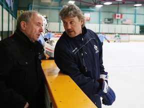 Sherry Bassin, left, director of hockey operations for the French River Rapids, talks to Rapids' head coach Ken Strong during spring tryouts for the team at Gerry McCrory Countryside Sports Complex in Sudbury, Ont. on Saturday April 22, 2017. John Lappa/Sudbury Star/Postmedia Network