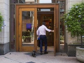 A man walks into the Indigo store along Bay St. at Bloor St. W. in downtown Toronto on Wednesday, September 27, 2017. (ERNEST DOROSZUK/TORONTO SUN)