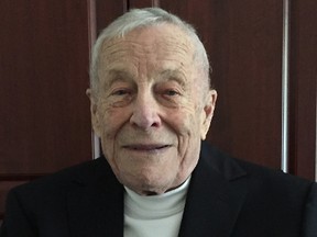 Clare Drake models his Hockey Hall of Fame blazer on Sept. 26, 2017. The University of Alberta Golden Bears coaching legend is being inducted into the Hall later in November.