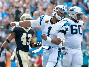 Cam Newton of the Carolina Panthers reacts after scoring a touchdown against the New Orleans Saints during their game at Bank of America Stadium on Sept. 24, 2017 in Charlotte, North Carolina. (Grant Halverson/Getty Images)