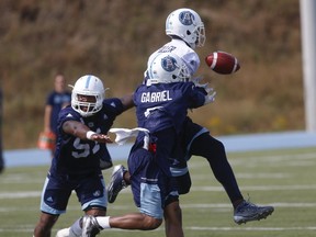 Toronto Argonauts safety Jermaine Gabriel helps break up a pass to Jeff Fuller at practice in Toronto on Sept. 27, 2017. (Jack Boland/Toronto Sun/Postmedia Network)