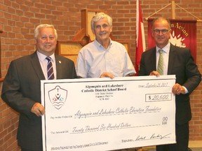 SUBMITTED PHOTO
Algonquin and Lakeshore Catholic Education Foundation chairman Tom Dall, (left), receives a cheque for more than $20,000 from John Brisbois, (middle) chairman of ALCDSB and ALCDSB director of education Jody DiRocco from  the Director's Charity Golf Tournament.