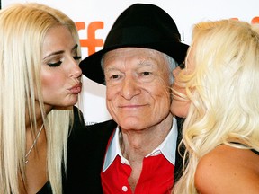 Publisher Hugh Hefner (C) arrives with Playboy Playmates Kristina Shannon (L) and Crystal Harris at the &ampquot;Hugh Hefner: Playboy, Activist And Rebel&ampquot; screening during the 2009 Toronto International Film Festival held at the Visa Screening Room at the Elgin Theatre on Sept. 12, 2009 in Toronto.  (Jim Ross/Getty Images)