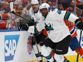 San Jose Sharks' Joel Ward chases a puck during the second period of a Stanley Cup playoffs game against the Edmonton Oilers at Rogers Place in Edmonton on April 12, 2017. (Ian Kucerak/Postmedia)