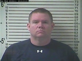 This Oct. 13, 2016 booking image released by the Hardin County Detention Center, shows Stephen Kyle Goodlett, the former principal of LaRue County, Ky. High School. Goodlett, of Elizabethtown, Ky., was indicted Wednesday, Jan. 5, 2017, in Louisville on federal charges of possessing and transporting child pornography, news outlets reported. He admitted to seizing students’ phones so that he could steal pornographic images from them and trade them online, investigators said. He was fired after his arrest in October. (Hardin County Detention Center via AP)