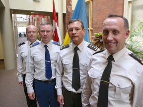 Ukrainian Maj.-Gen. Anatoliy Petrenko, right, heads a delegation that visited the Royal Military College and the Canadian Defence Academy in Kingston on Wednesday. Petrenko was joined by, from right, Maj.-Gen. Oleh Hruntkovskyi, Col. Yurii Finohenov and Col. Viktor Siromakha. (Elliot Ferguson/The Whig-Standard)