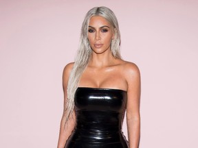 Kim Kardashian is confirming that she and Kanye West are having a third child. (Charles Sykes/Invision/AP/Files)