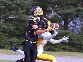 Nicholas Witzke makes the catch in the end zone to score a touch down during senior boys high school football action against the  Confederation Chargers in Sudbury, Ont. on Thursday September 28, 2017. Gino Donato/Sudbury Star/Postmedia Network