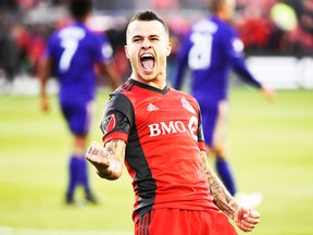 Toronto FC forward Sebastian Giovinco (10) celebrates his goal against Orlando City SC during first half MLS soccer action in Toronto on Wednesday, May 3, 2017. THE CANADIAN PRESS/Nathan Denette