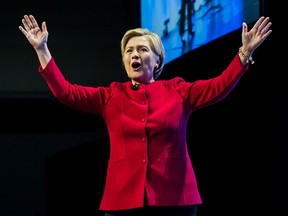 Hillary Clinton speaks to an audience in Toronto promoting her new book "What Happened" on Thursday, September 28, 2017. (THE CANADIAN PRESS/Christopher Katsarov)