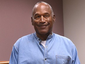 In this July 20, 2017, file photo, former NFL football star O.J. Simpson enters for his parole hearing at the Lovelock Correctional Center in Lovelock, Nev.  (Jason Bean/The Reno Gazette-Journal via AP, Pool, File)