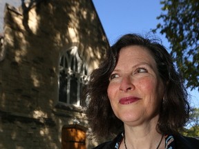 Filmmaker Leslea Mair, whose latest project is the feature-length documentary Losing Our Religion, poses for a photograph outside St. Ignatius Church in Winnipeg on Wed., Sept. 27, 2017. Kevin King/Winnipeg Sun