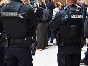 Gendarmes are pictured in this September 20, 2017 file photo at the Paris courthouse. (ERIC FEFERBERG/AFP/Getty Images)