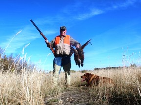 Neil and Penny with a limit of Daysland cock ringneck pheasants