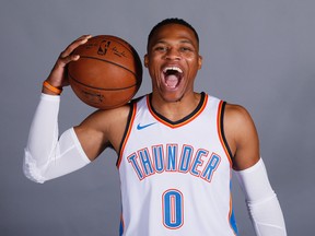 Oklahoma City Thunder guard Russell Westbrook lets out a roar during NBA media day in Oklahoma City on Sept. 25, 2017. (AP Photo/Sue Ogrocki)