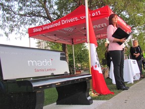 MADD Canada president Patrica Hynes-Coates speaks Thursday evening at Sarnia's Centennial Park during the dedication of a bench installed by the local MADD chapter. Hynes-Coates is among those concerned about the impact Canada's coming marijuana law changes will have on impaired driving. (Paul Morden/Sarnia Observer)