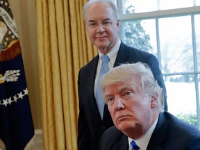 In this March 24, 2017 file photo, U.S. President Donald Trump with Health and Human Services Secretary Tom Price are seen in the Oval Office of the White House in Washington. (AP Photo/Pablo Martinez Monsivais, File)