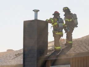 Firefighters responded to a townhouse condo fire that broke out at approximately 9:30am at 3115-119 Street in Edmonton on Friday September 29, 2017. LARRY WONG/POSTMEDIA