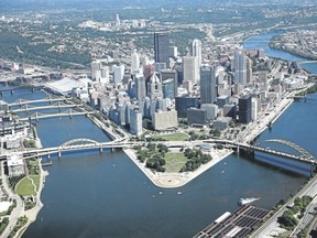 The Allegheny, left, and Monongahela rivers converge at Point State Park in central Pittsburgh to form the Ohio River.