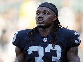 In this Aug. 14, 2015, file photo, Oakland Raiders running back Trent Richardson warms up before an NFL preseason game in Oakland, Calif. (AP Photo/Ben Margot, File)