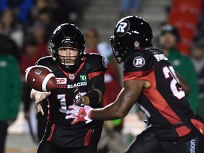 Ottawa Redblacks quarterback Ryan Lindley throws the ball to teammate running back William Powell during first half CFL football action against the Saskatchewan Roughriders in Ottawa on Sept. 29, 2017. (THE CANADIAN PRESS/Justin Tang)