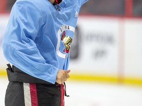 Derick Brassard changes into a blue non-contact jersey as the Ottawa Senators continue to practice at the Canadian Tire Centre during training camp on Sept. 21, 2017. (Wayne Cuddington/Postmedia)