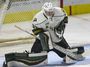 London Knights goal Jordan Kooy makes a save during the first period of their OHL hockey game against the Kingston Frontenac at Budweiser Gardens in London, Ont. on Friday September 29, 2017. (DEREK RUTTAN, The London Free Press)