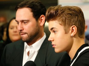Scooter Braun and singer Justin Bieber attend the Tribeca Disruptive Innovation Awards during the 2012 Tribeca Film Festival at the NYU Paulson Auditorium on April 27, 2012 in New York City. (Photo by Jemal Countess/Getty Images)