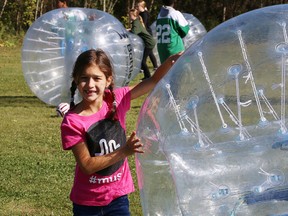 Brooke Plante, 7, prepares to play a game of bubble soccer at the opening of Percy Park Sports Centre in Sudbury, Ont., on Saturday September 30, 2017. John Lappa/Sudbury Star/Postmedia Network