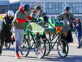 The team from TD Bank pulls ahead of the Trenton Rotary Club team during the first round of the Bankers Bed Races on Saturday September 30, 2017 in Trenton, Ont. The races were raising funds for the purchase of new beds for Trenton Memorial Hospital. Tim Miller/Belleville Intelligencer/Postmedia Network