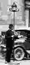 Other traffic semaphores officers used were fitted up top with a kerosene lamp so the commands could be better seen at night. White gloves also made the officer more conspicuous at night.