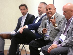 Shmuel Farhi of Farhi Holdings speaks on a panel along with (l-r) Alfonso Balassone of EllisDon, Adam Carapella of Tricar, Sean Ford of Dancor Construction at the Commercial Emerge Conference 2017 at the London-St. Thomas Real Estate Board office in London, Ont. (MIKE HENSEN, The London Free Press)