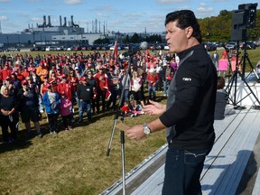 Jerry Dias, Unifor’s national president, speaks to more than 2,000 members on strike at GM’s Cami assembly plant in Ingersoll Sunday.  (MORRIS LAMONT, The London Free Press)