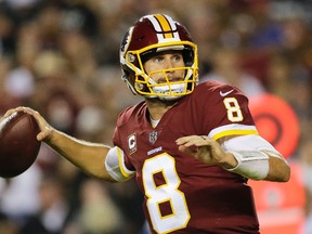 n this Sept. 24, 2017, fie photo, Washington Redskins quarterback Kirk Cousins (8) passes the ball during the first half of an NFL football game against the Oakland Raiders in Landover, Md. Just about the only things that Kansas City Chiefs quarterback Alex Smith and Cousins have in common heading into their Monday night showdown have been the results. (AP Photo/Mark Tenally, File)