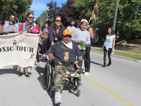 A "Toxic Tour" through the industrial area of Sarnia makes it way Sunday down Christina Street from its starting point at Rainbow Park. It was part of a Water Gathering held over the weekend at the Aamjiwhaang First Nation.
Paul Morden/Sarnia Observer/Postmedia Network